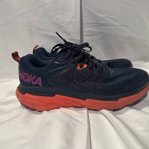 Hoka women’s Dark Blue and Bright Orange Athletic Shoes
